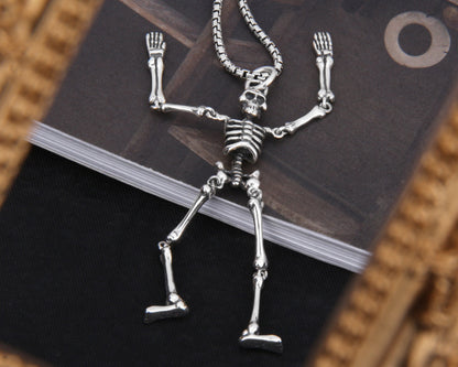 Hyperactive Skull Skeleton Pendant